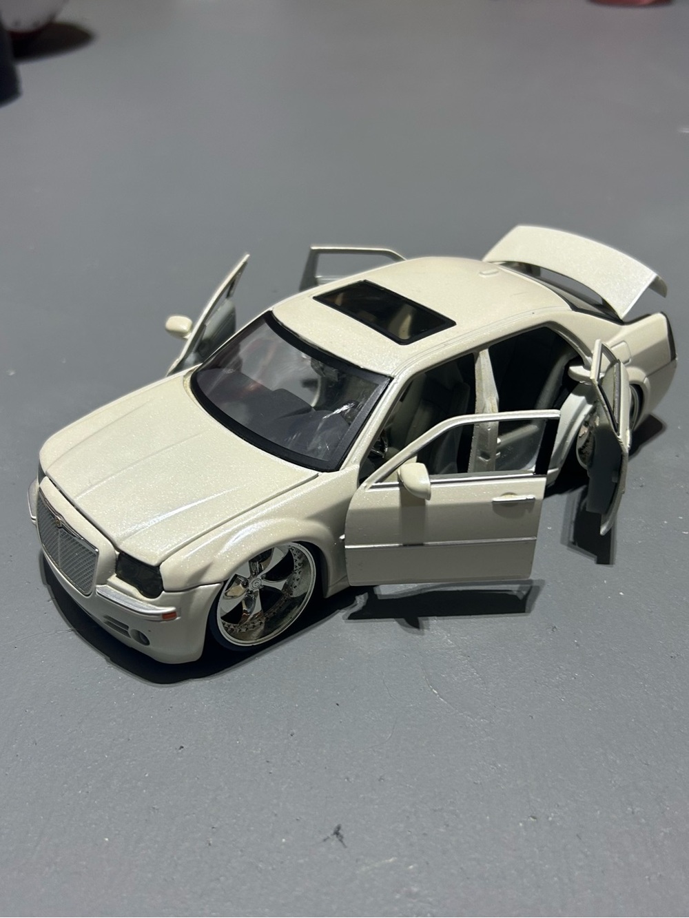 Chrysler 300 DUB Edition Sedan Toy Car with Opening Doors and Functioning Wheels